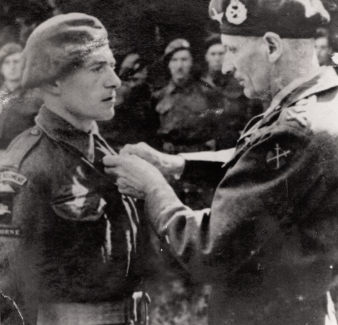 Pte J. Millward being awarded the M.M by General Montgomery - 01/09/1944