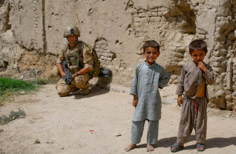 Soldier with Children in Kandahar City, June 2008