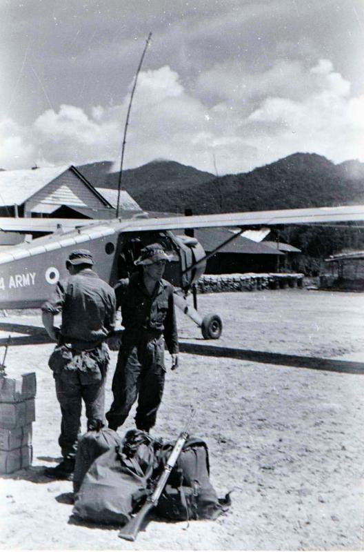 Brunei, waiting for helicopter into Ulu, 1965