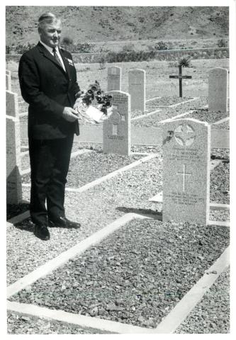 John Moran visiting the grave of Private McIntosh