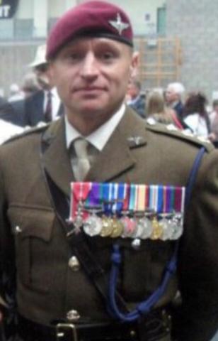 OS Captain Anthony Mark Hobbins in uniform wearing medals