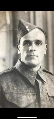 Pte W Marsh photographed in black and white in uniform.