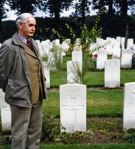 Gunner Robert Christie of C troop and comrade of David Plummer stands by Grave