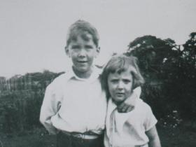 Keith Moore, aged 10, with his sister.