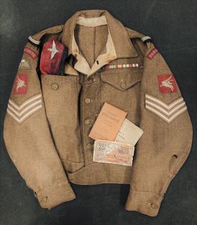 Hollobone's battle dress with insignias and beret
