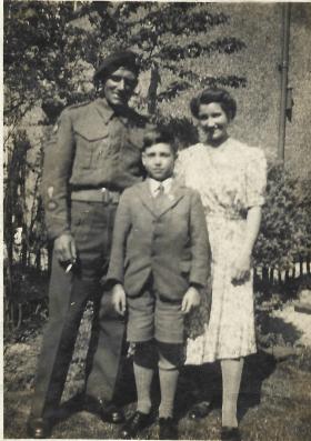 OS Dvr. C.M. Mackrell. R.A.S.C. with his wife and son. 1943/1944