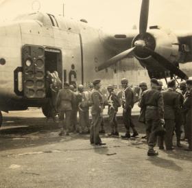 OS 11 Para boarding a US C119 Flying Boxcar as part of joint exercises in 1950's