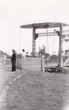Egyptian policeman guarding bridge over Sweet Water Canal, Ismailia, 9 July 1951