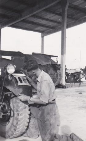 Pte David Hunt,3 Para, spruces up vehicle insignia, Wayne's Keep, Cyprus September 1951