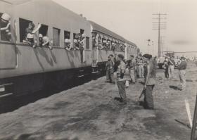 Railway carriages full of troops 