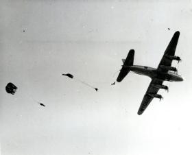 Paratroopers jumping from a Hastings 