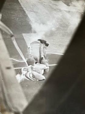 Eric Dobbs parachuting with kit bag