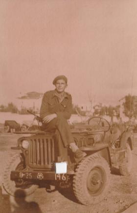 OS Lt Howard Trevor Walley on Willys Jeep photograph sent to family whilst on active service