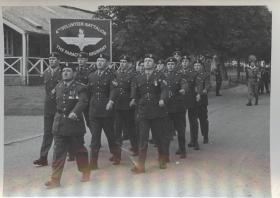 Ernest John Lewis marching with members of the 4th (volunteer) Parachute Battalion
