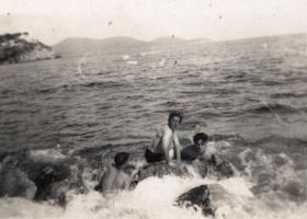 Private Leslie Jenner swimming with friends from 7th Bn. in Palestine