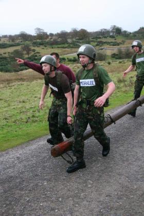OS M Flynn participating in a log race