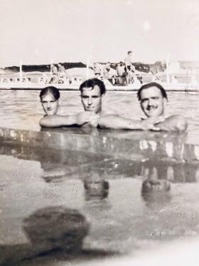 George Harwood swimming with friends