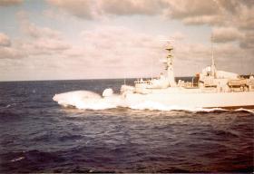 View of British warship 1982 crashing through ocean waves