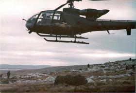 OS Helicopter flying over The Falklands 1982