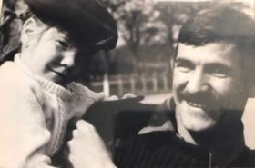 OS Andrew Moodie and child wearing beret