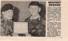 Newspaper clipping showing Brig. Joe Starling presenting a Bravery Award