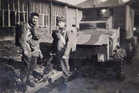 OS This photo is of Jim Parker and Peter Law (?) standing in from of a Bedford OXA improvised armoured car. Possibly taken at RAF Ringway.