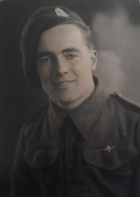Leonard T Carlier wearing Suffolk Regiment cap badge