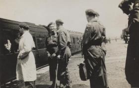 Brigadier Hill with Canadian Paratroopers getting ready to go home, Aldershot station 1945