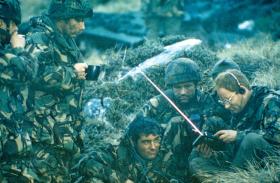Members of Support Coy HQ, 2 PARA, listening to the BBC World News, Sussex Mountain c22– 26 May 1982.