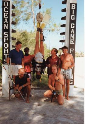 Soldiers show off their 'Big Game Fishing' prize, Kenya, 1990