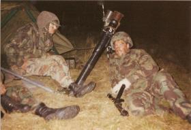 Pte Keith Carver and Pte Lee Crichton of A Coy, 4 PARA Mortars on night shoot, 1980s