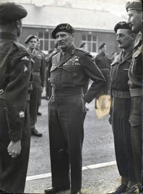 Photograph of Field Marshal Bernard Law Montgomery inspecting the troops