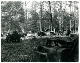Wrecked jeeps and trailers in the Hartenstein Hotel grounds (Divisional HQ).
