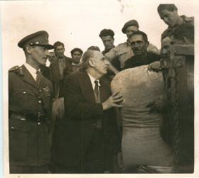 Greek PM Georgios Papandreou and General Scobie with food supplies.