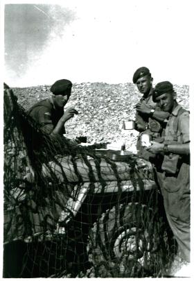 Three members of 3 PARA with their mess tins in the Canal Zone.