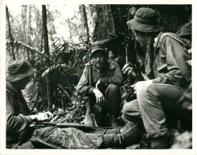 2 PARA soldiers on a pause during jungle patrol, Borneo.