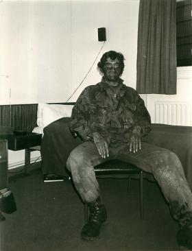 Captain Simon Barry relaxes after an operation.
