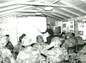 Paratroopers attend a pre-operation briefing.