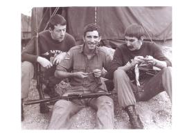 Corporal Stephen Prior (right) and comrades clean their rifles.