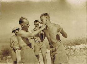 Private Bingham taking a bashing, c1940s.