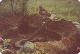 Pte Crichton of A Coy, 4 PARA Mortars beside the 4.2inch mortar pit on exercise in Minnesota, 1983