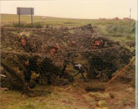 Men of A Coy, 4 PARA Mortars under a temporary shelter on exercise at Warcop Training Area, 1980s