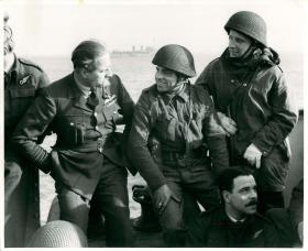 Squadron Leader PC Pickard talks to the men he dropped at Bruneval.
