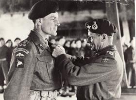 Brigadier Hill receiving award from Field Marshal Montgomery
