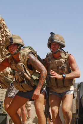 Paras rush to their firing positions during a camp attack, FOB Gilbraltar, Afghanistan, 2008