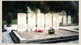 Gravestones to Airborne soldiers at St Vaast-en-Auge Churchyard, Normandy