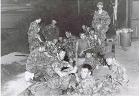 Group photo of C Coy 'Marauders' resting before a night patrol, Hong Kong, 1980