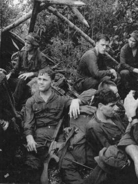 Guards Para Coy members rest during the long march to Ipho Training Camps, Malaya, 1964.