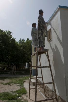 Helping to paint a school in Maywand, Afghanistan April 2008