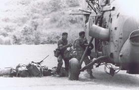 Paras loading a resupply helicopter on the Tolo Peninsular, Hong Kong, 1980